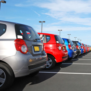 An image of a row of cars at a dealership